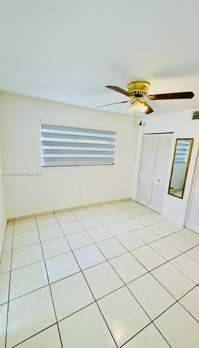 6070 West 19th Avenue, Unit 307 Hialeah, FL 33012 - Photo 12 of 19 a view of a garage