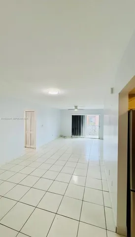 a view of a room with windows