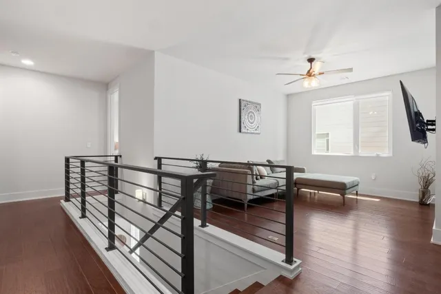a view of a livingroom with furniture and a couch