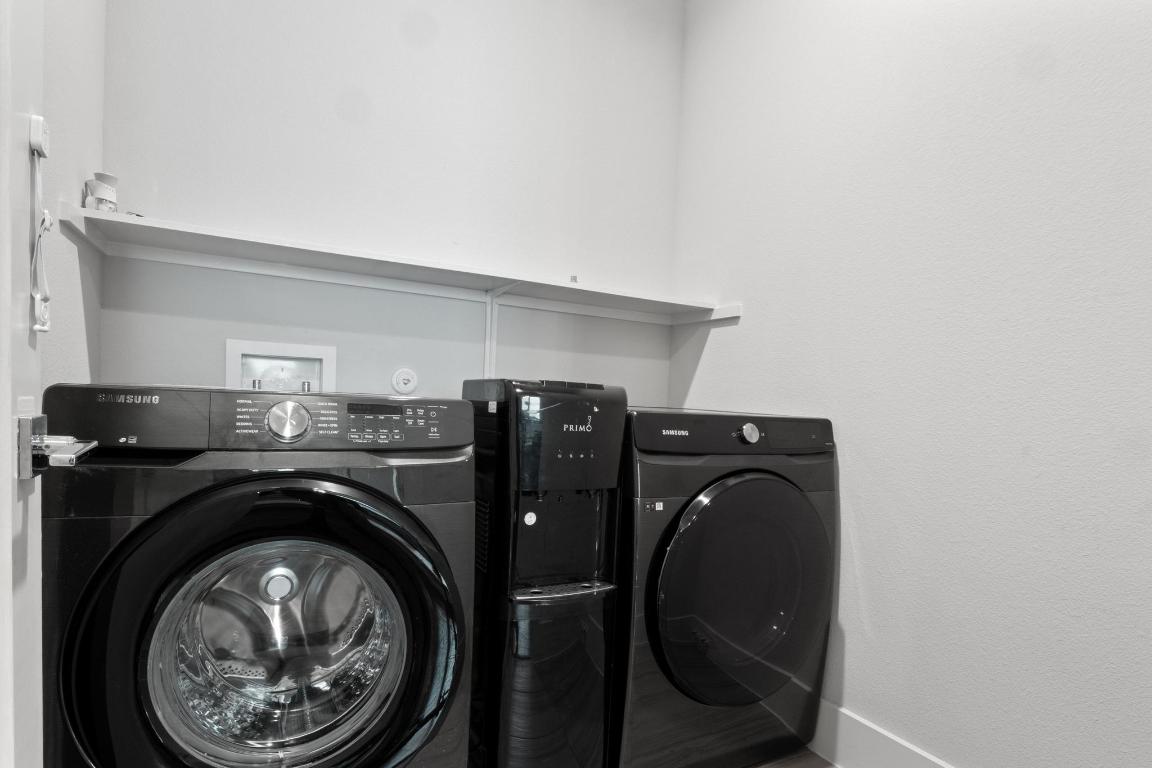 7924 Yellow Thistle Trail, Unit 39 Austin, TX 78735 - Photo 16 of 26 a close up view of washer and dryer