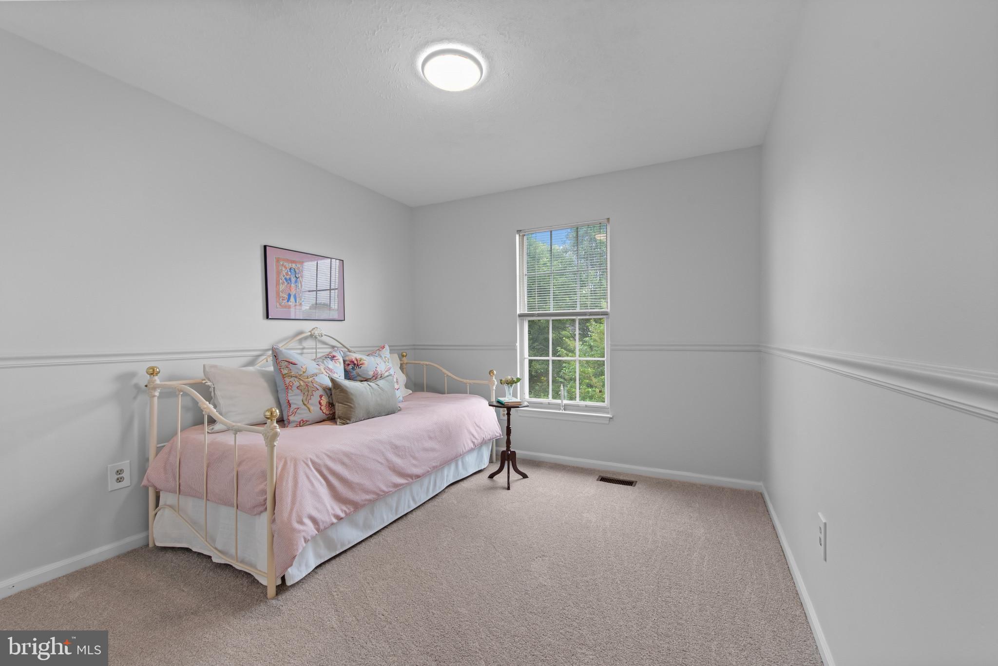 3107 Pouska Road Abingdon, MD 21009 - Photo 27 of 38 a spacious bedroom with a bed and a window