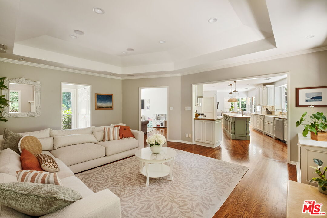 1265 Inverness Drive Pasadena, CA 91103 - Photo 12 of 56 a living room with furniture and a wooden floor