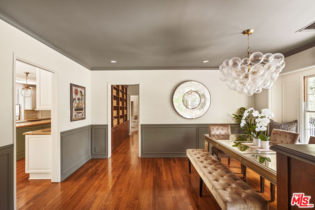 1265 Inverness Drive Pasadena, CA 91103 - Photo 18 of 56 a view of a hallway with wooden floor