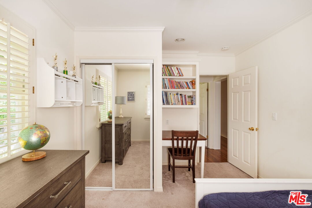 1265 Inverness Drive Pasadena, CA 91103 - Photo 38 of 56 a view of a livingroom with furniture and window