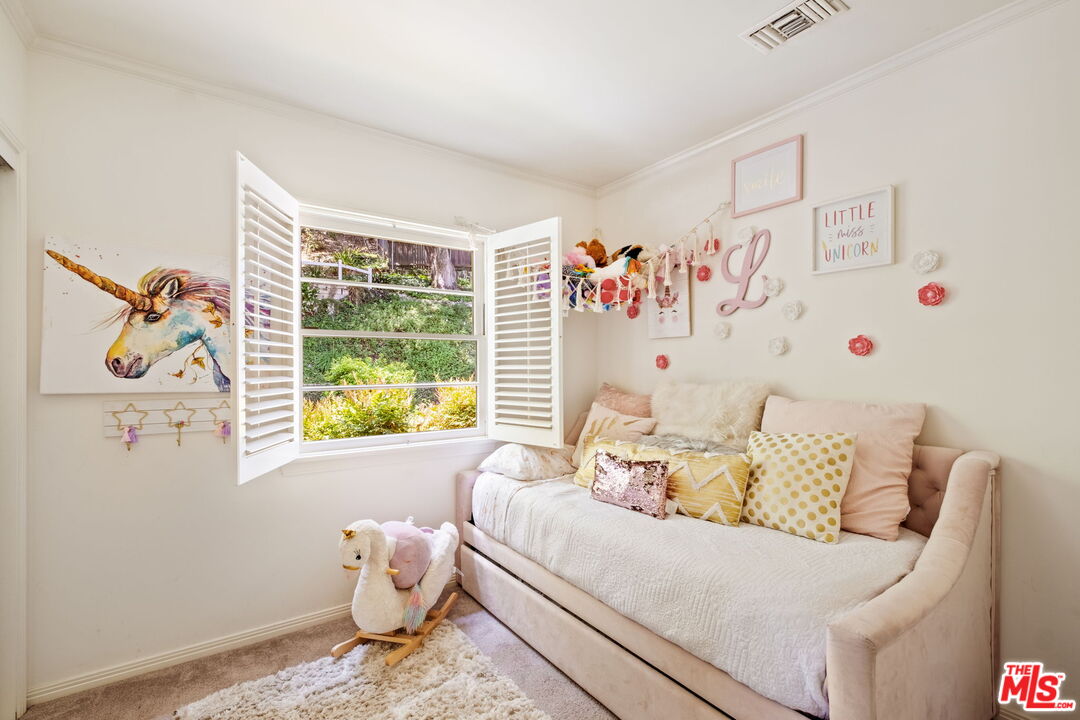 1265 Inverness Drive Pasadena, CA 91103 - Photo 41 of 56 a living room with furniture and a window