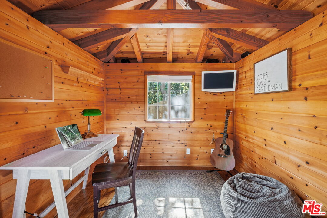 1265 Inverness Drive Pasadena, CA 91103 - Photo 49 of 56 a balcony with table and chairs