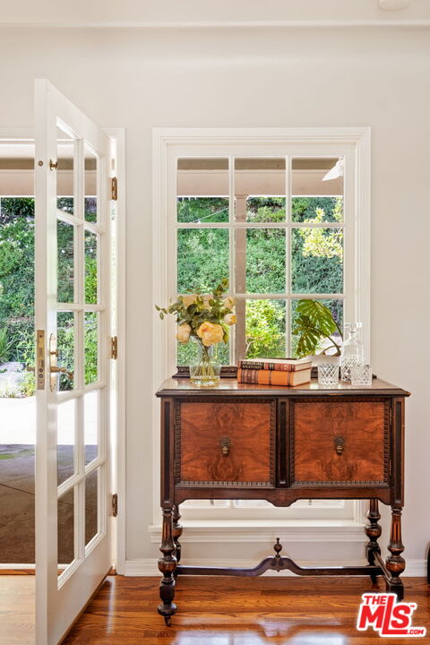 1265 Inverness Drive Pasadena, CA 91103 - Photo 8 of 56 a view of swimming pool from a living room