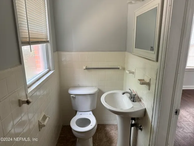a bathroom with a sink and a toilet