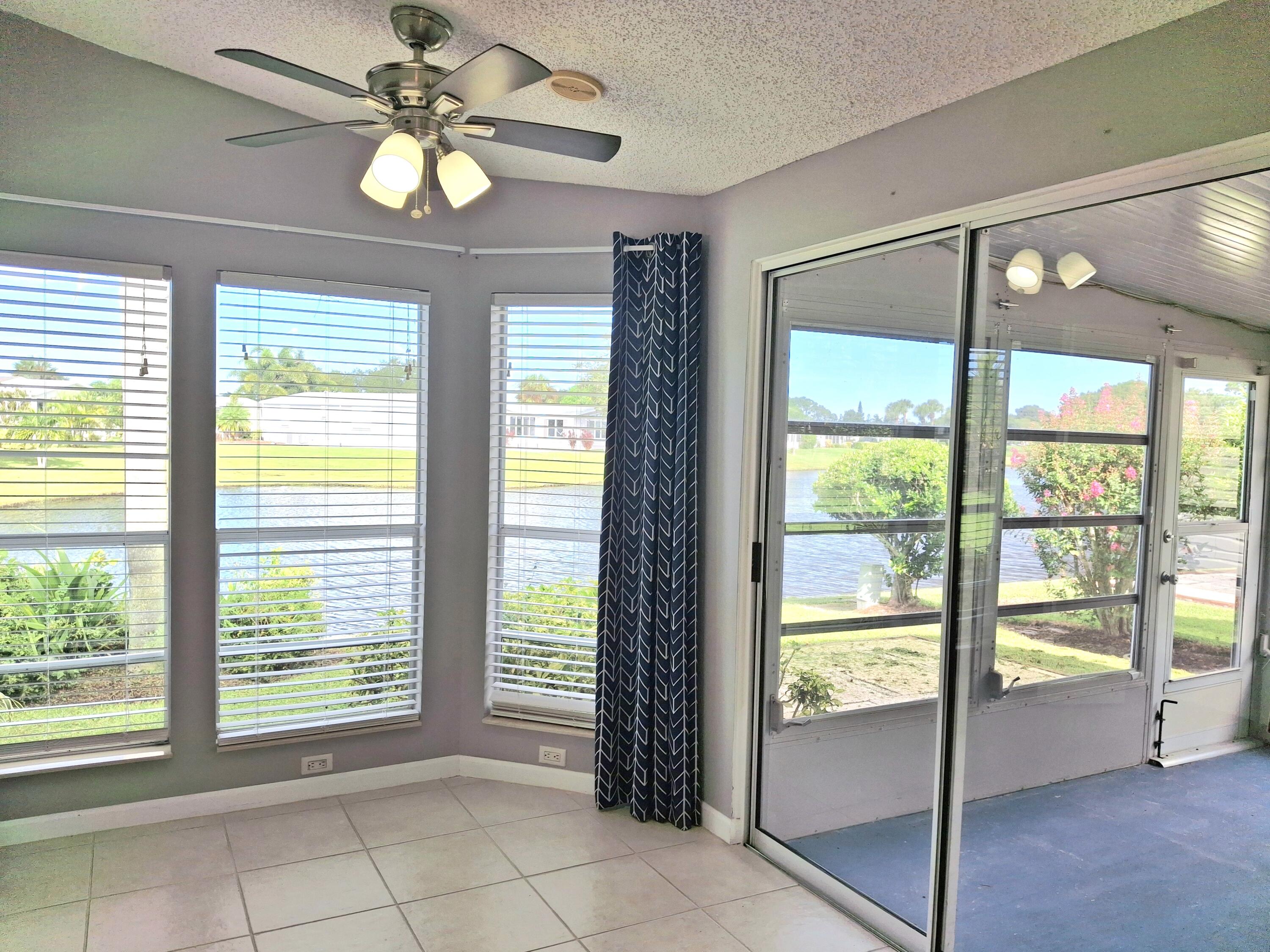 8483 Schefflera Court Port St. Lucie, FL 34952 - Photo 11 of 33 a view of an empty room with a window
