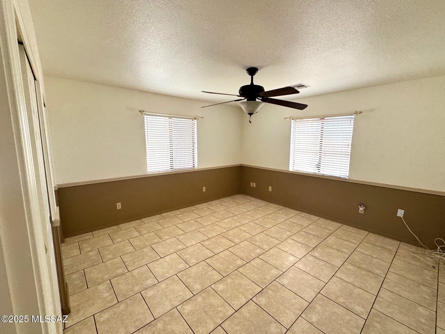 13384 South Cottonwood Road Pearce, AZ 85625 - Photo 15 of 46 a view of an empty room and a window