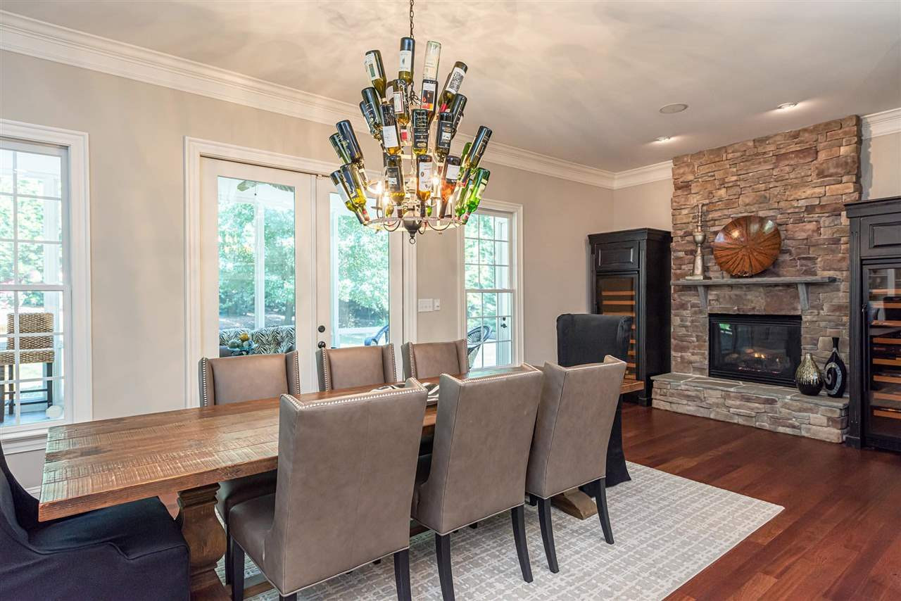 2024 Macon Ridge Road Raleigh, NC 27613 - Photo 11 of 30 9 foot table, 6 leather chairs, 2 captains chairs and rug for sale Breakfast/keeping room