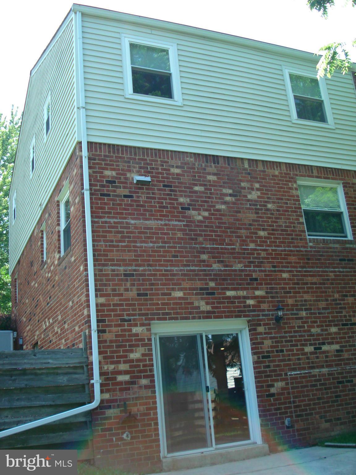 58 Timber Rock Road Gaithersburg, MD 20878 - Photo 18 of 22 Back of Home with Walk-Out to Patio