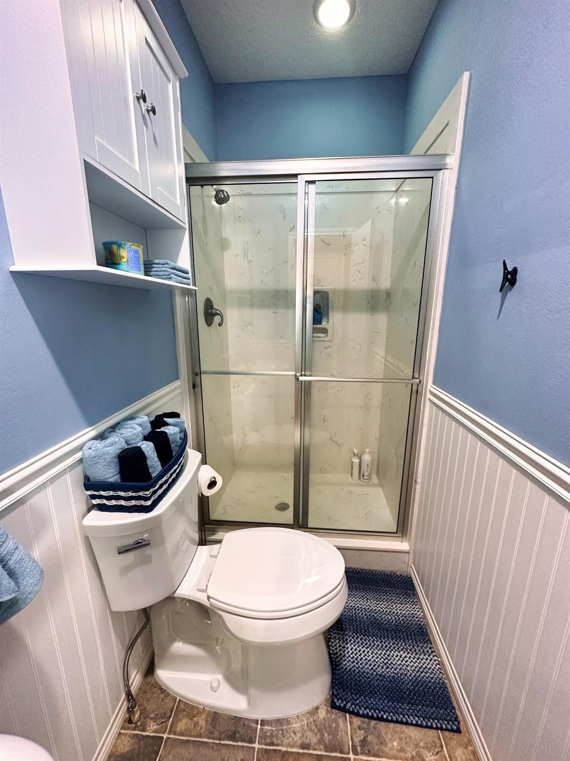 1867 County Road 291 Sargent, TX 77414 - Photo 21 of 31 a bathroom with a toilet and a shower