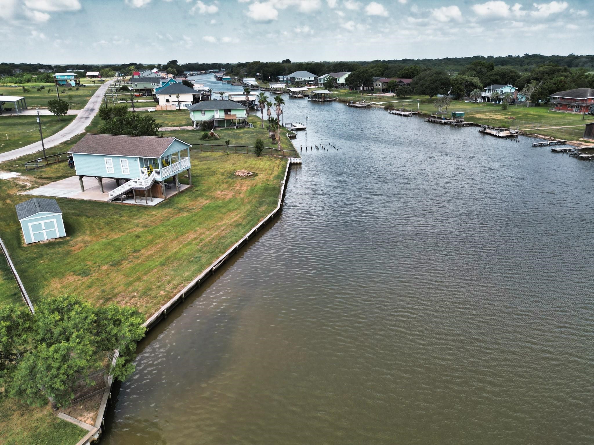 1867 County Road 291 Sargent, TX 77414 - Photo 29 of 31 a view of a lake with outdoor space