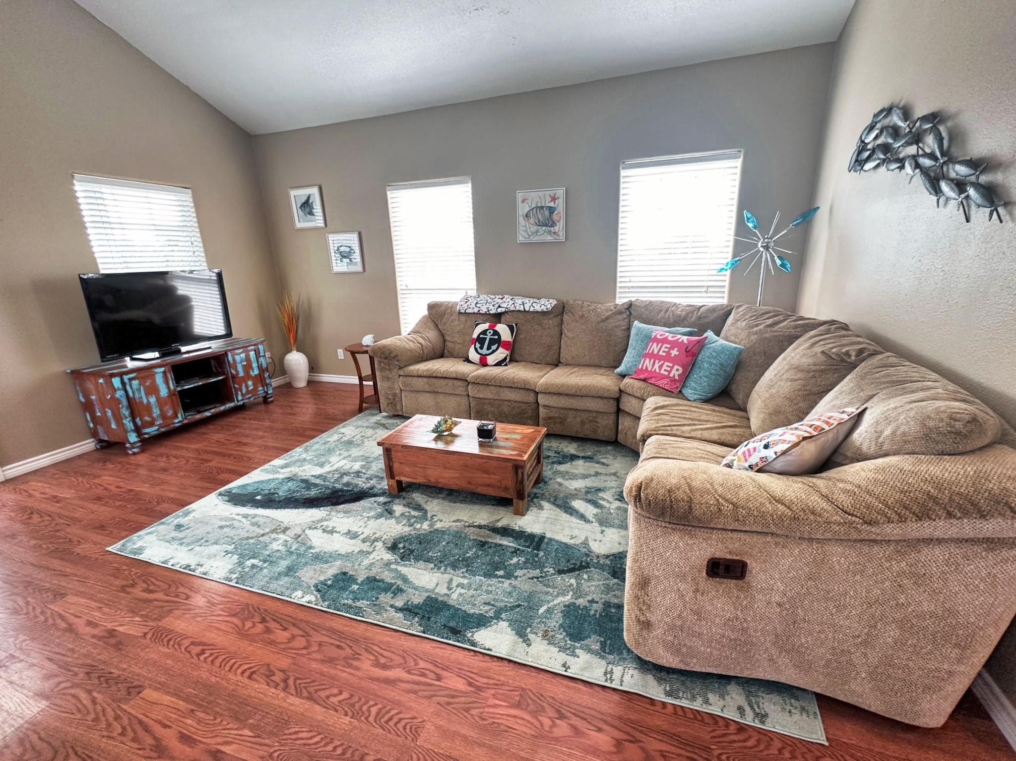 1867 County Road 291 Sargent, TX 77414 - Photo 8 of 31 a living room with furniture and a flat screen tv