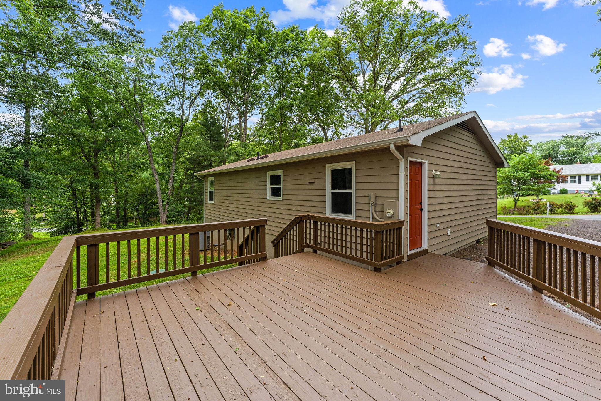 1821 James City Road Reva, VA 22735 - Photo 36 of 44 a view of a wooden deck with a yard