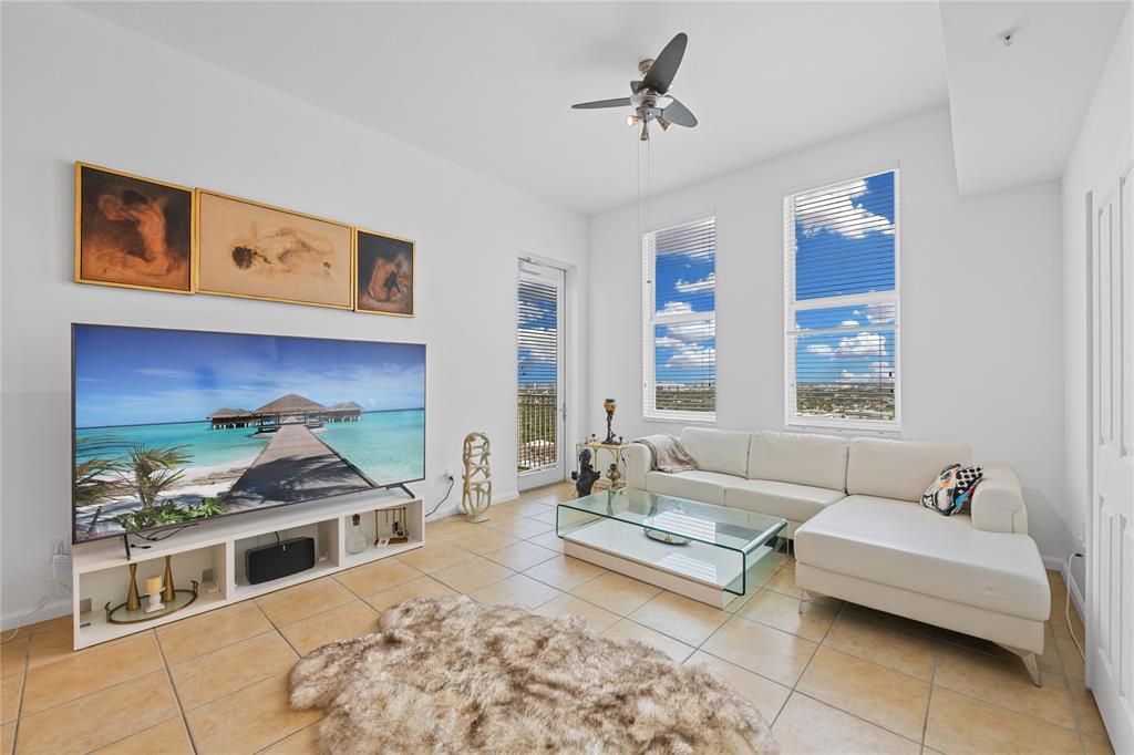 511 Southeast 5th Avenue, Unit 1906 Fort Lauderdale, FL 33301 - Photo 13 of 64 a living room with furniture and a fireplace
