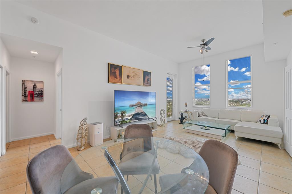 511 Southeast 5th Avenue, Unit 1906 Fort Lauderdale, FL 33301 - Photo 16 of 64 a living room with furniture and a wooden floor