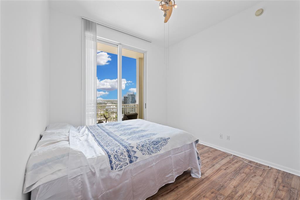 511 Southeast 5th Avenue, Unit 1906 Fort Lauderdale, FL 33301 - Photo 22 of 64 a bedroom with a bed and a window