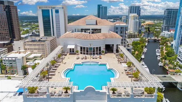 a living room with lots of furniture and a table