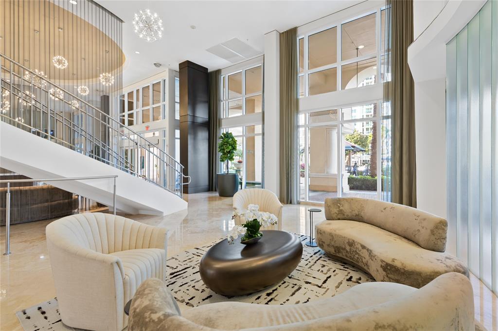 511 Southeast 5th Avenue, Unit 1906 Fort Lauderdale, FL 33301 - Photo 48 of 64 a living room with furniture and a large window