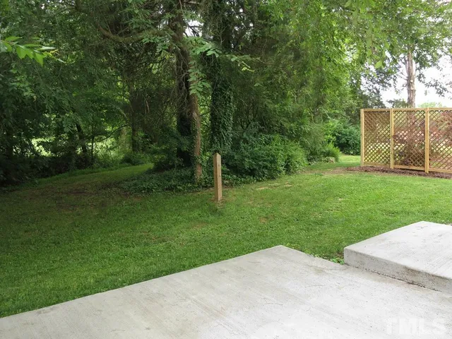 a view of a park with a trees