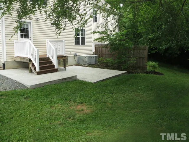 a view of a backyard with a garden