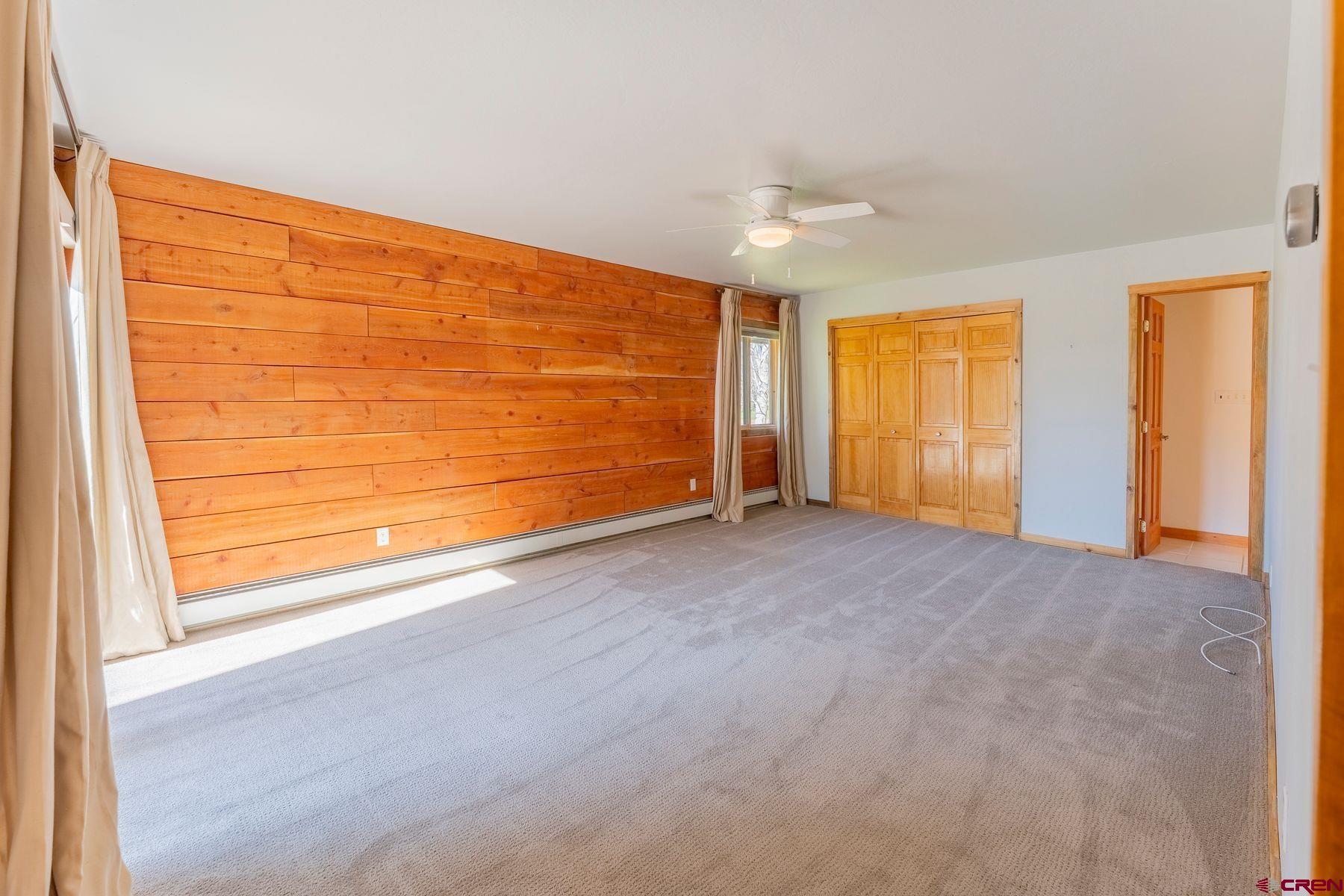 169 Camino Del Rio, Unit 8 Gunnison, CO 81230 - Photo 15 of 35 a view of an empty room with a window