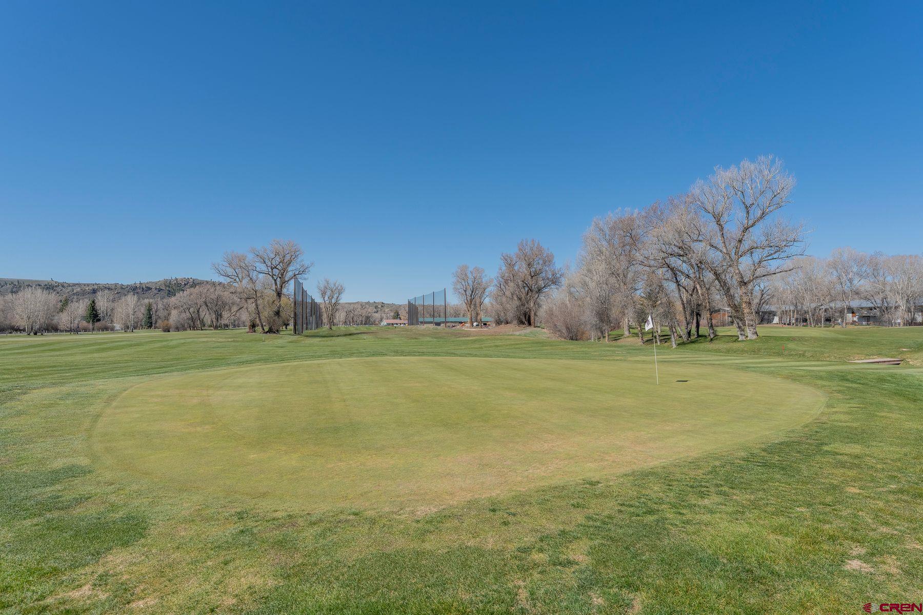 169 Camino Del Rio, Unit 8 Gunnison, CO 81230 - Photo 31 of 35 a view of a field with an trees
