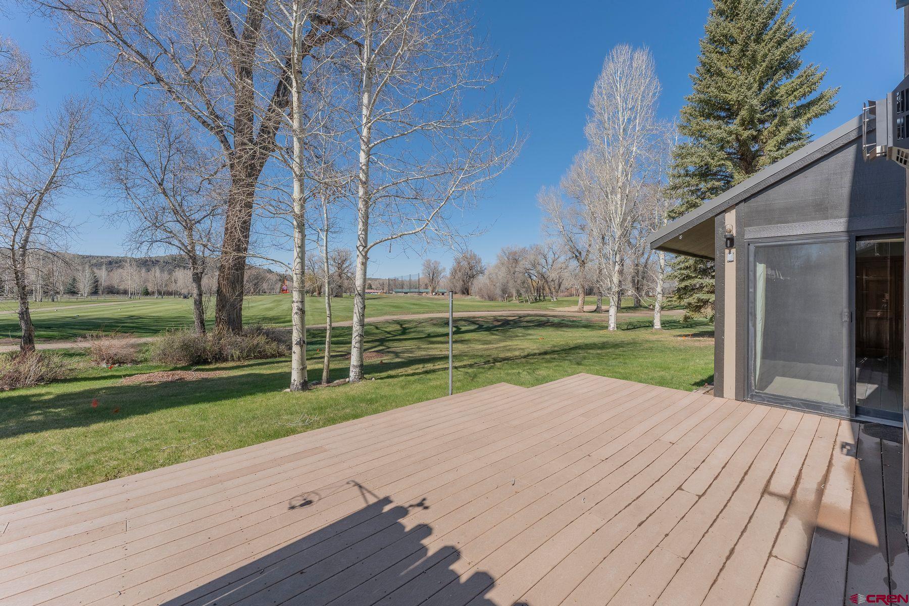 169 Camino Del Rio, Unit 8 Gunnison, CO 81230 - Photo 4 of 35 a view of a house with a yard