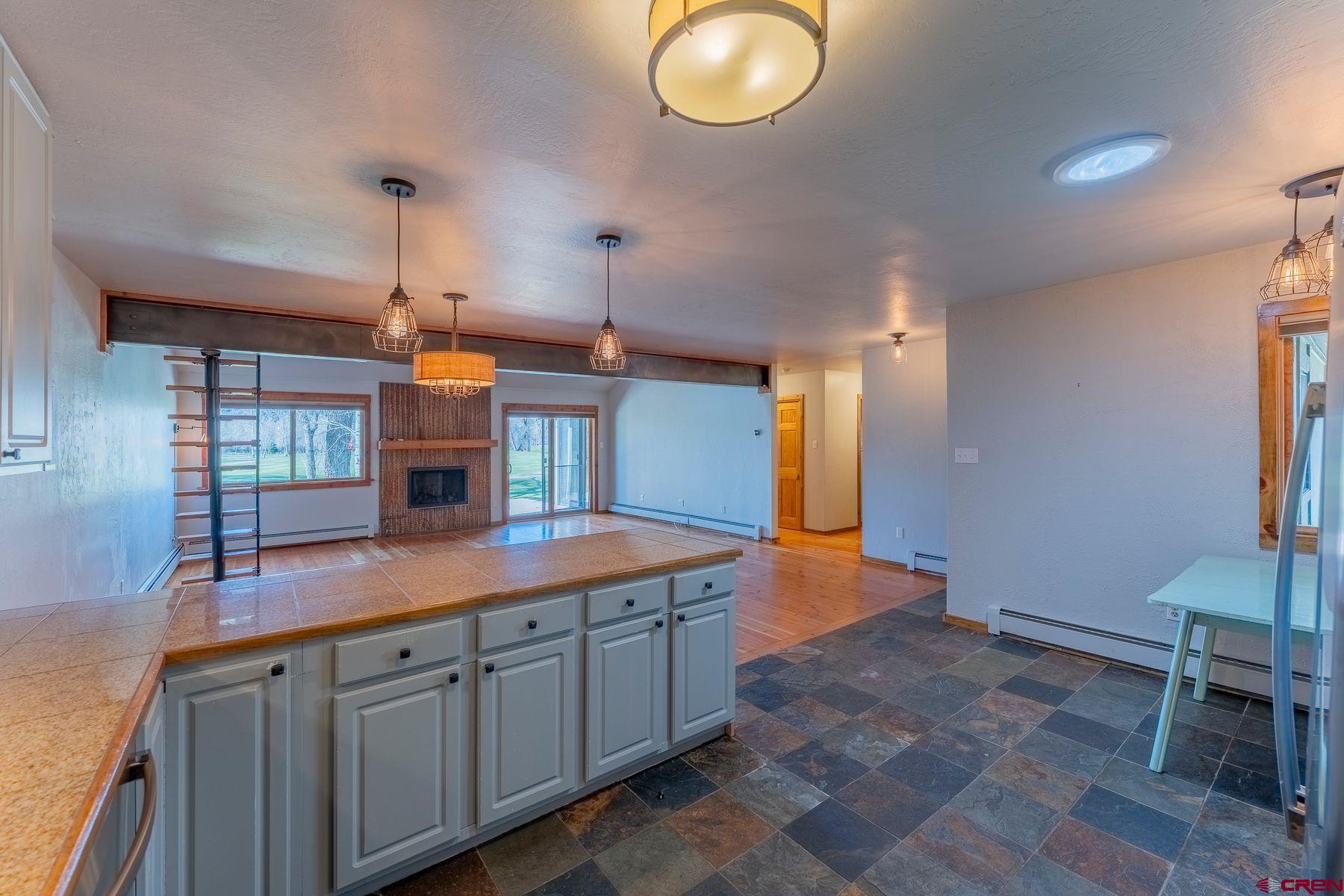 169 Camino Del Rio, Unit 8 Gunnison, CO 81230 - Photo 8 of 35 a kitchen with a sink and a stove