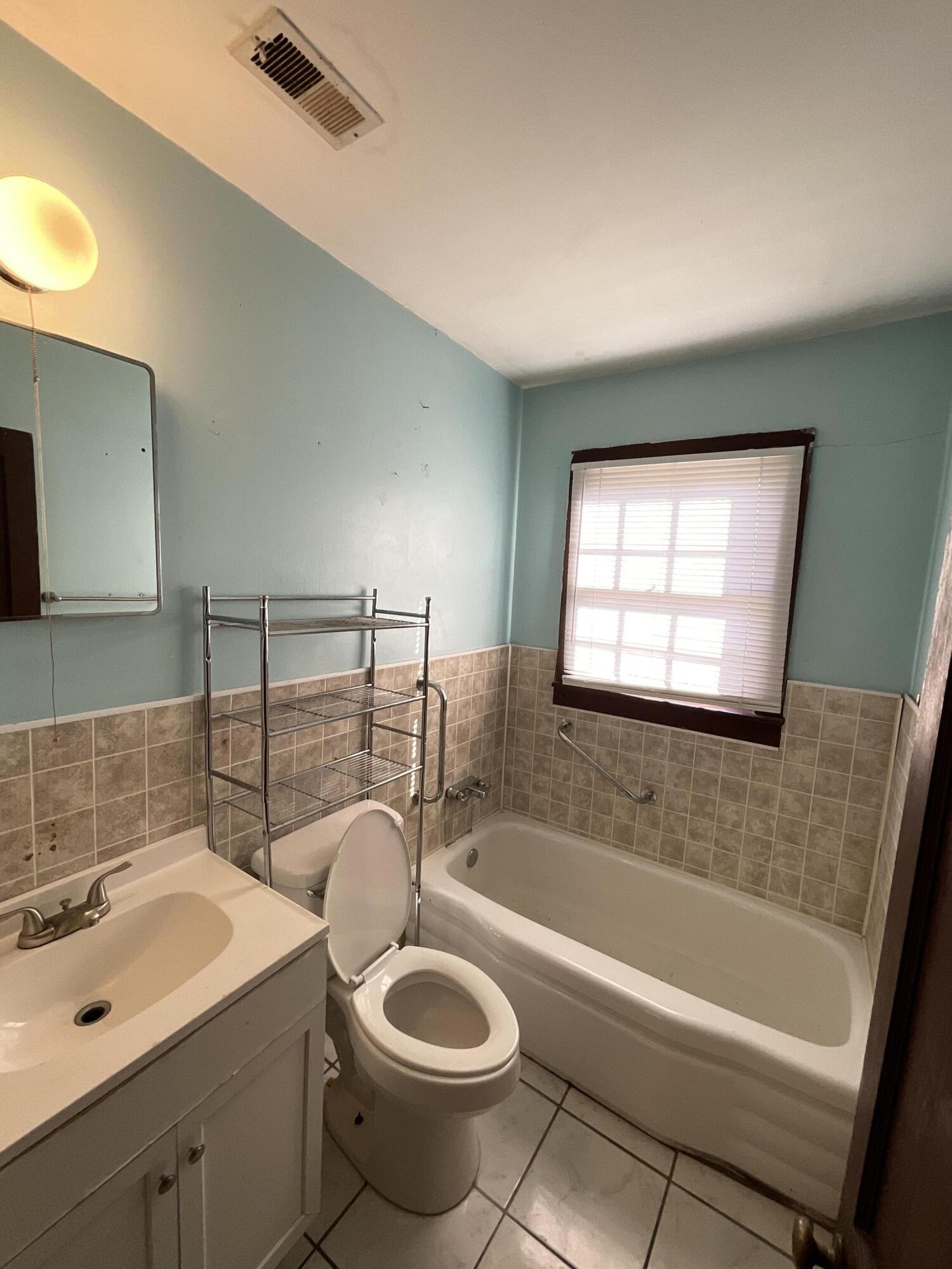 1694 Douglas Street Augusta, GA 30901 - Photo 14 of 14 Hall Bathroom