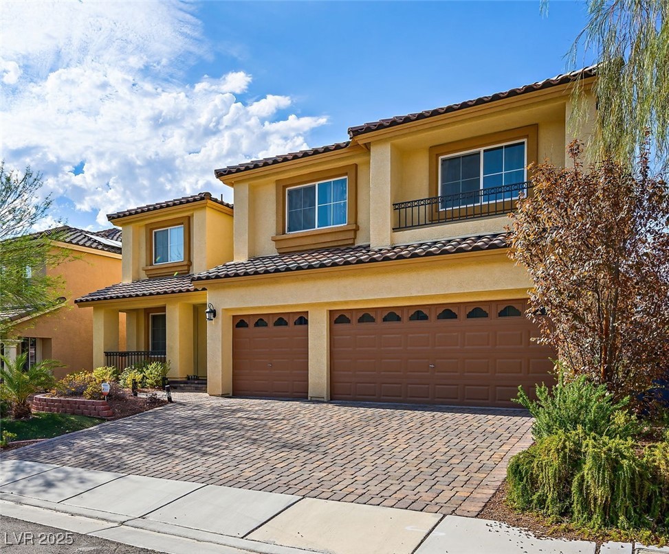 6239 Mustang Spring Avenue Las Vegas, NV 89139 - Photo 1 of 28 Front of Home with 3 car garage