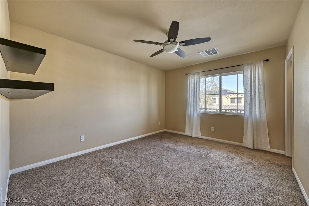 6239 Mustang Spring Avenue Las Vegas, NV 89139 - Photo 25 of 28 Bedroom 2 with walk-in closet