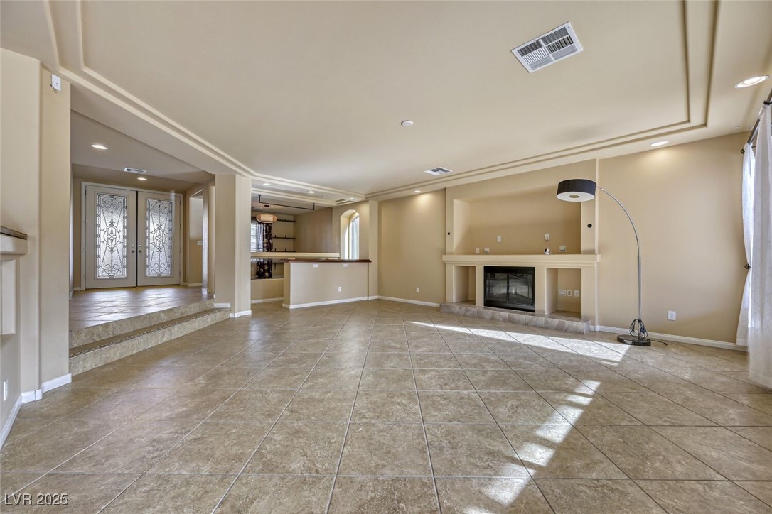 6239 Mustang Spring Avenue Las Vegas, NV 89139 - Photo 10 of 28 Great Room/Family Room with Dry Bar overlooking the Library/Downstairs Office.