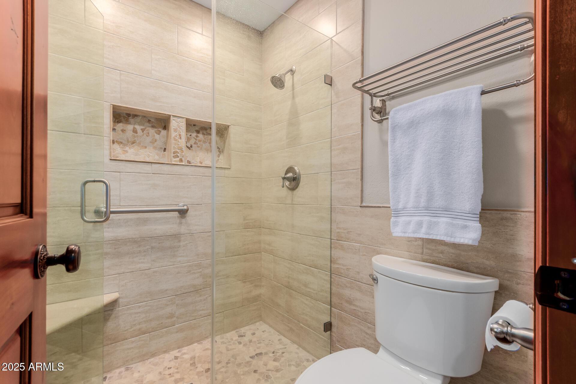 5525 East Thomas Road, Unit E3 Phoenix, AZ 85018 - Photo 19 of 31 a bathroom with a toilet and shower