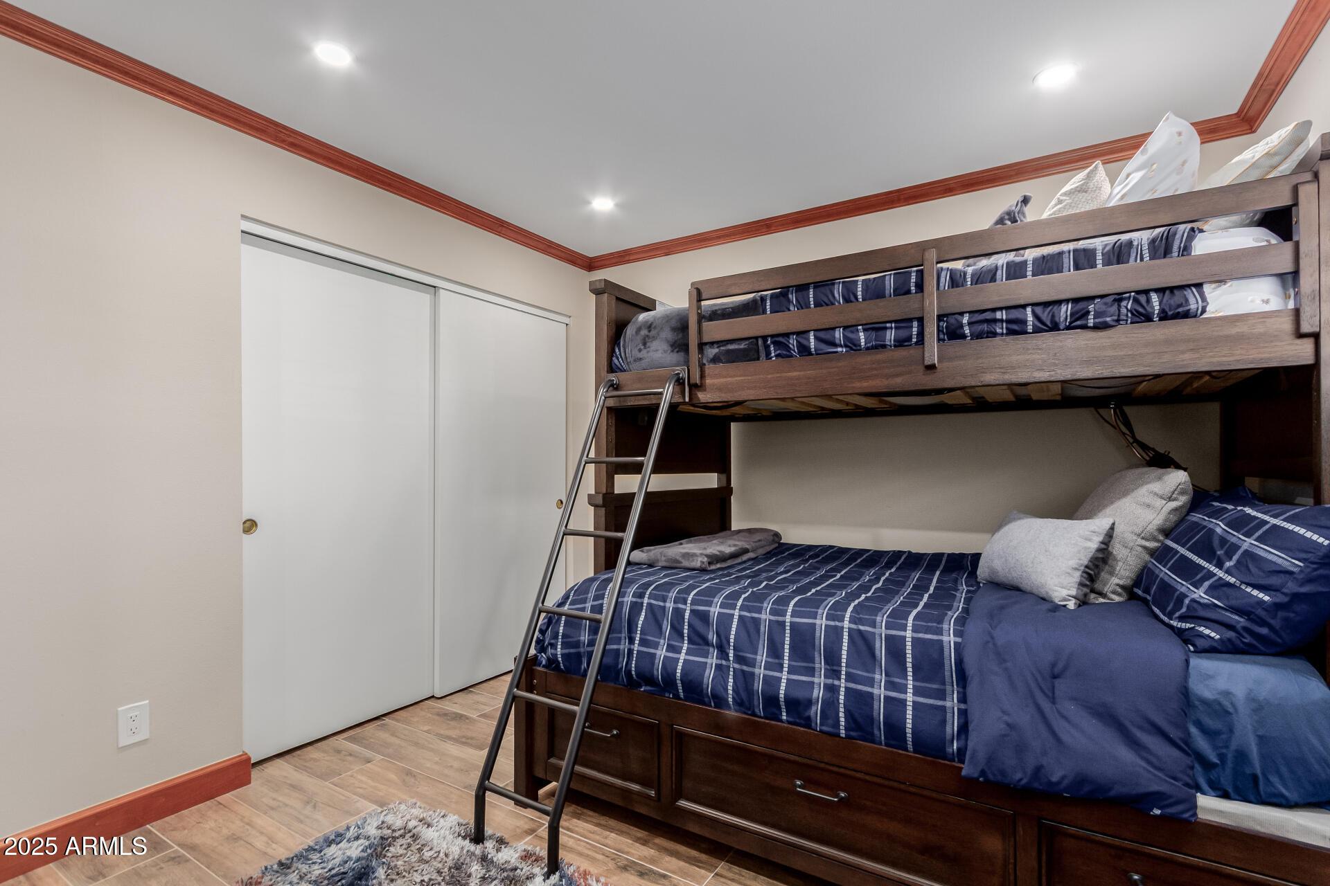 5525 East Thomas Road, Unit E3 Phoenix, AZ 85018 - Photo 22 of 31 a bedroom with furniture and a window