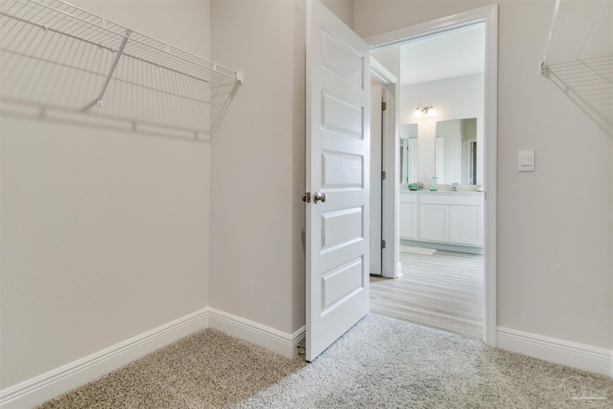 4745 Redhead Court Pace, FL 32571 - Photo 32 of 44 a view of a bathroom with tub