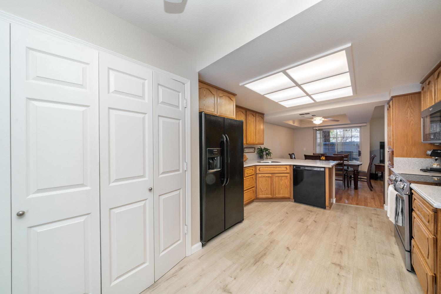 4112 Alex Lane Carmichael, CA 95608 - Photo 14 of 36 a kitchen with stainless steel appliances granite countertop a refrigerator and a sink