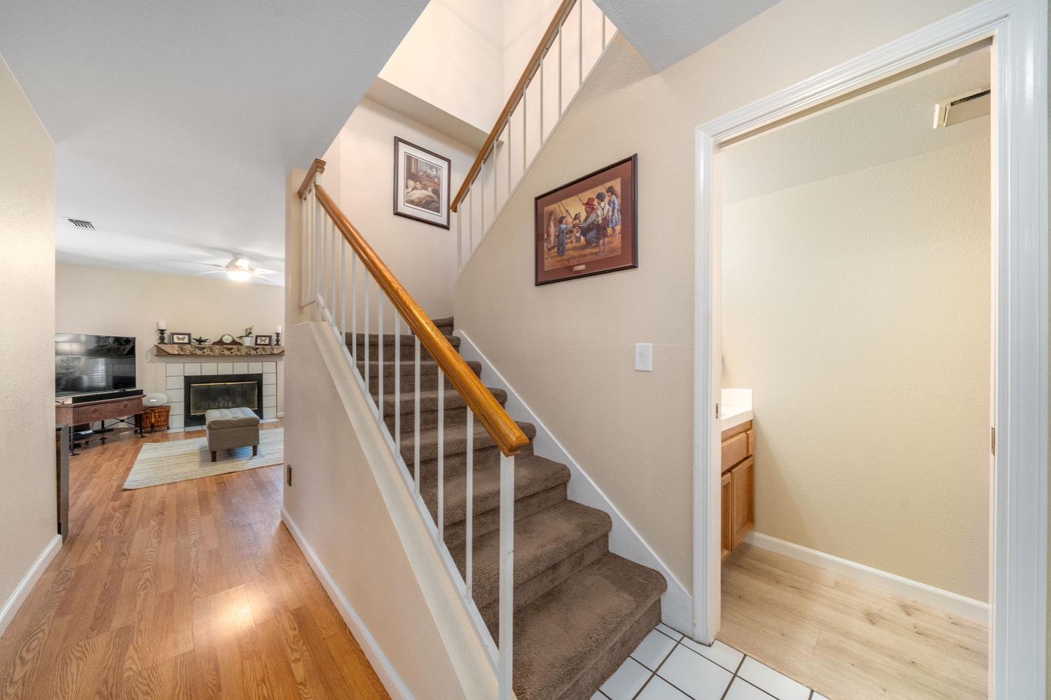 4112 Alex Lane Carmichael, CA 95608 - Photo 16 of 36 a view of entryway and hall with wooden floor