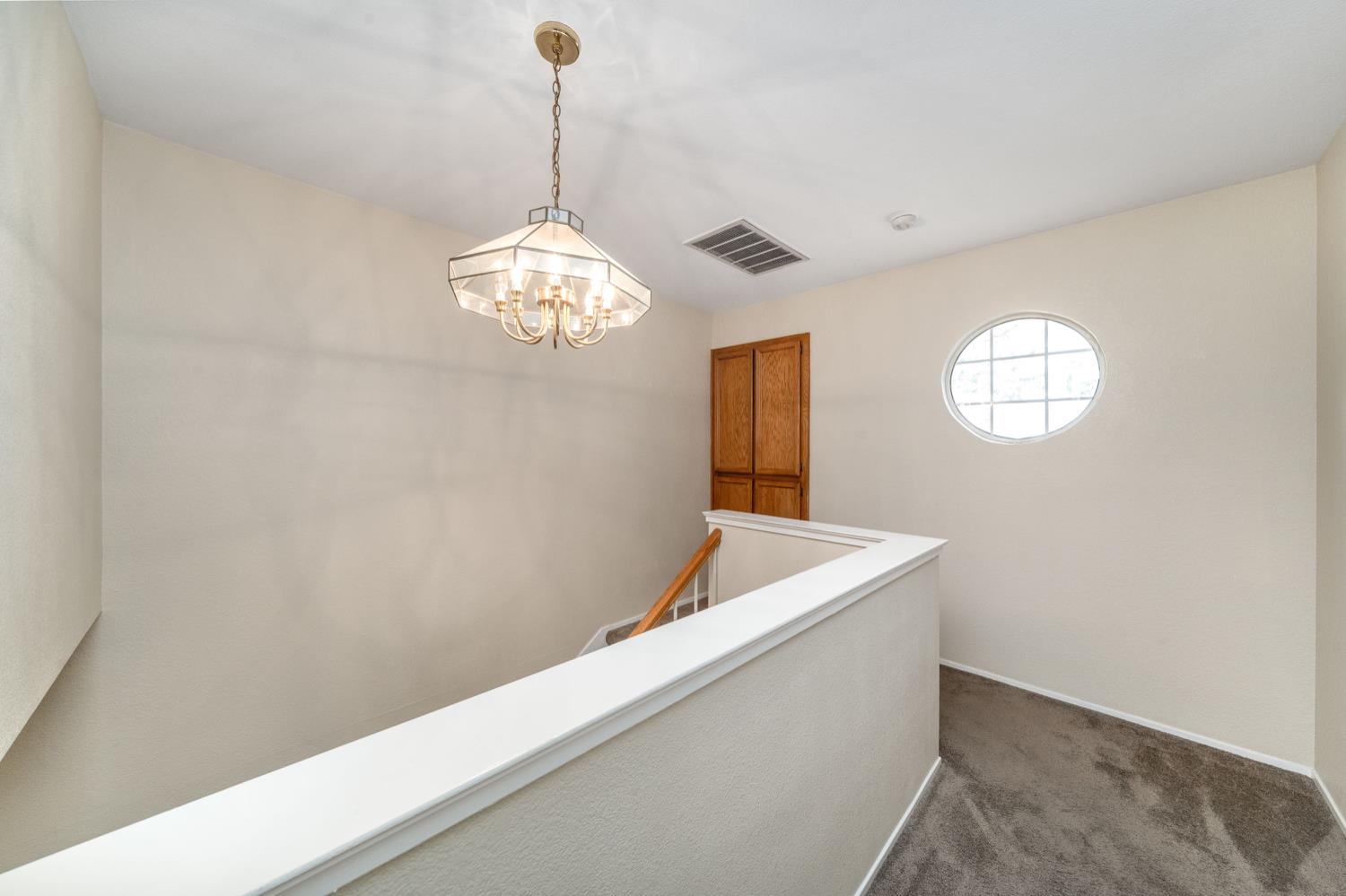 4112 Alex Lane Carmichael, CA 95608 - Photo 20 of 36 a view of a hallway with windows