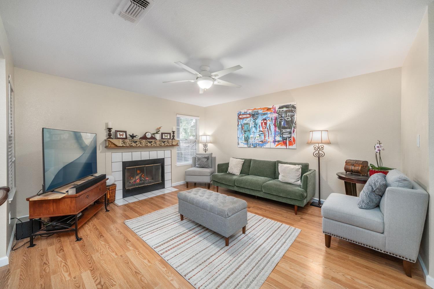 4112 Alex Lane Carmichael, CA 95608 - Photo 3 of 36 a living room with furniture and a fireplace