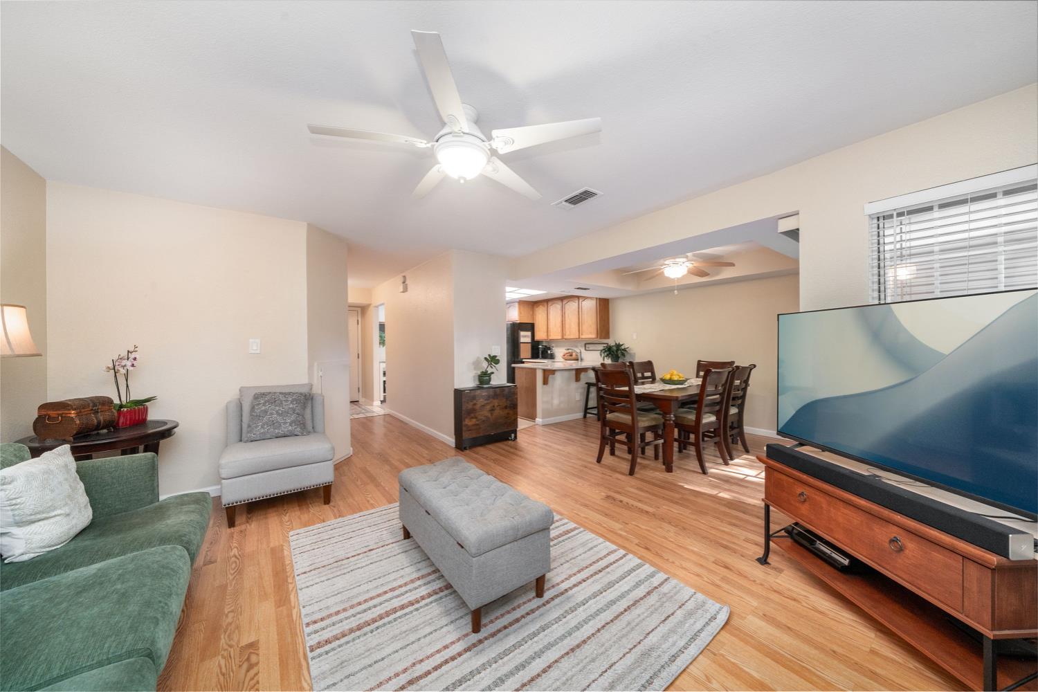 4112 Alex Lane Carmichael, CA 95608 - Photo 6 of 36 a living room with furniture and wooden floor