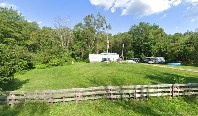 a garden view with a seating space