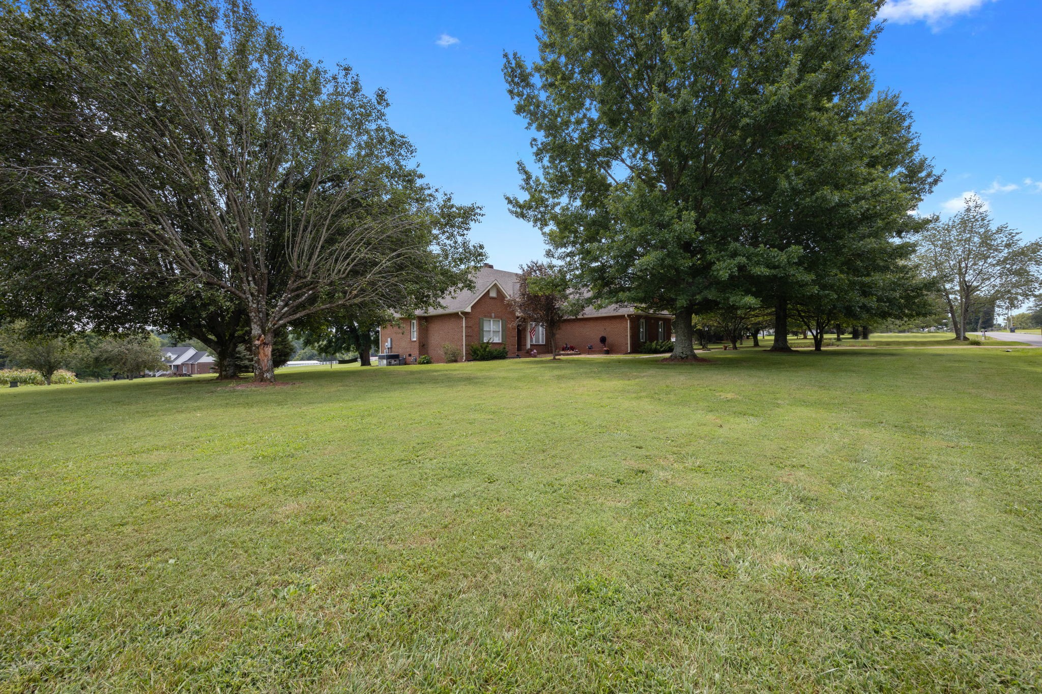 298 Corinth Road Portland, TN 37148 - Photo 3 of 49 a view of a field of grass and trees