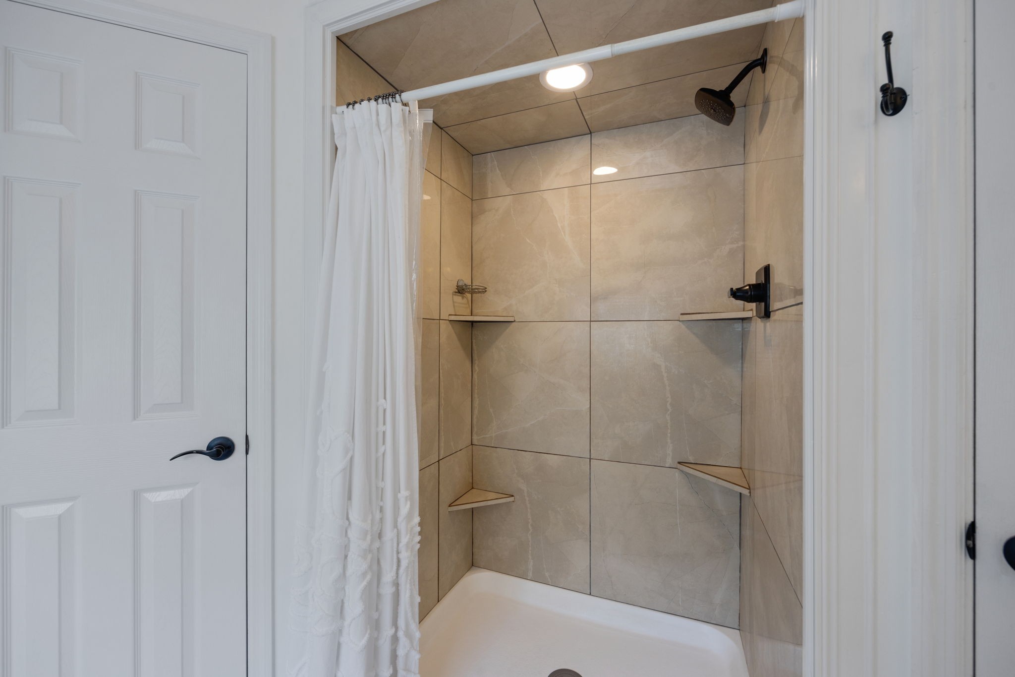 298 Corinth Road Portland, TN 37148 - Photo 31 of 49 a bathroom with a shower