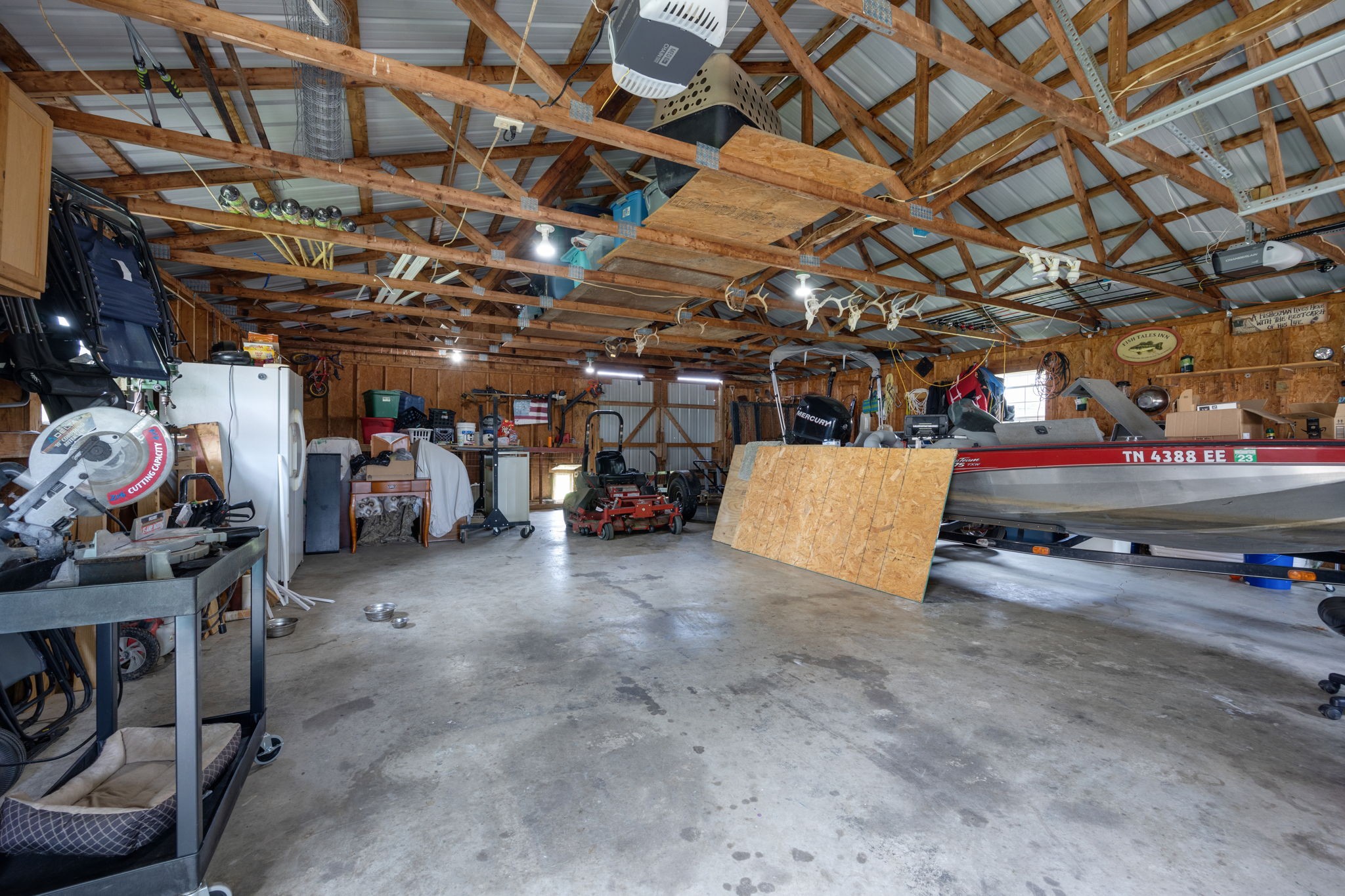 298 Corinth Road Portland, TN 37148 - Photo 42 of 49 a view of parking garage with lots of stuff
