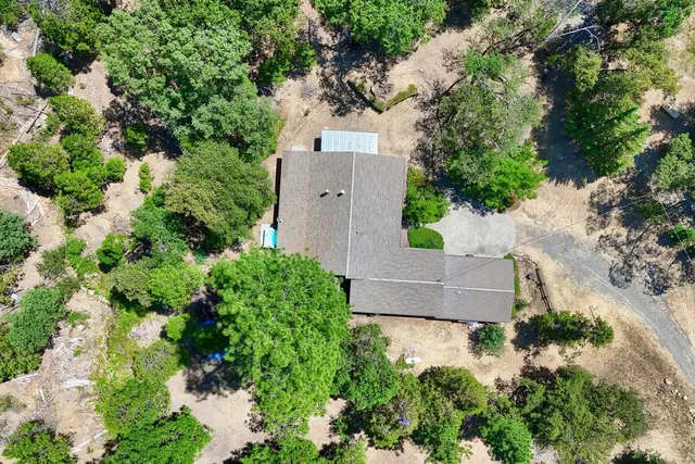 a view of a town with mountains in the background