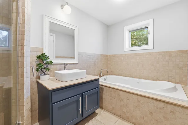 a bathroom with a sink and a bathtub