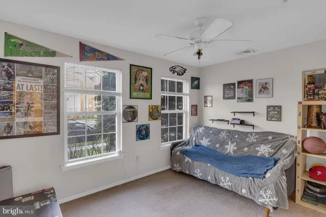 a living room with furniture and window